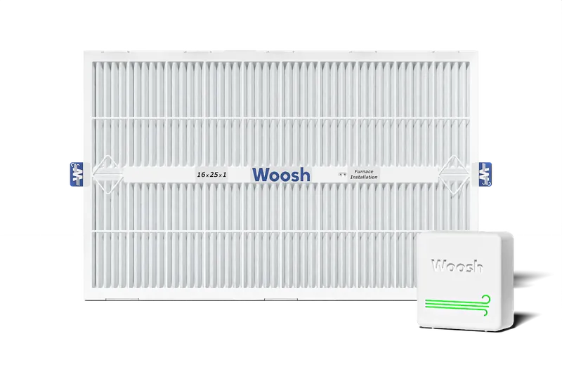 Woosh smart HVAC air filter in a 16 x 25 x 1 inch frame, shown with the white Woosh sensor puck in front of it